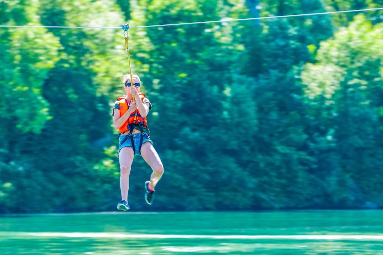 Zip-lining over a river